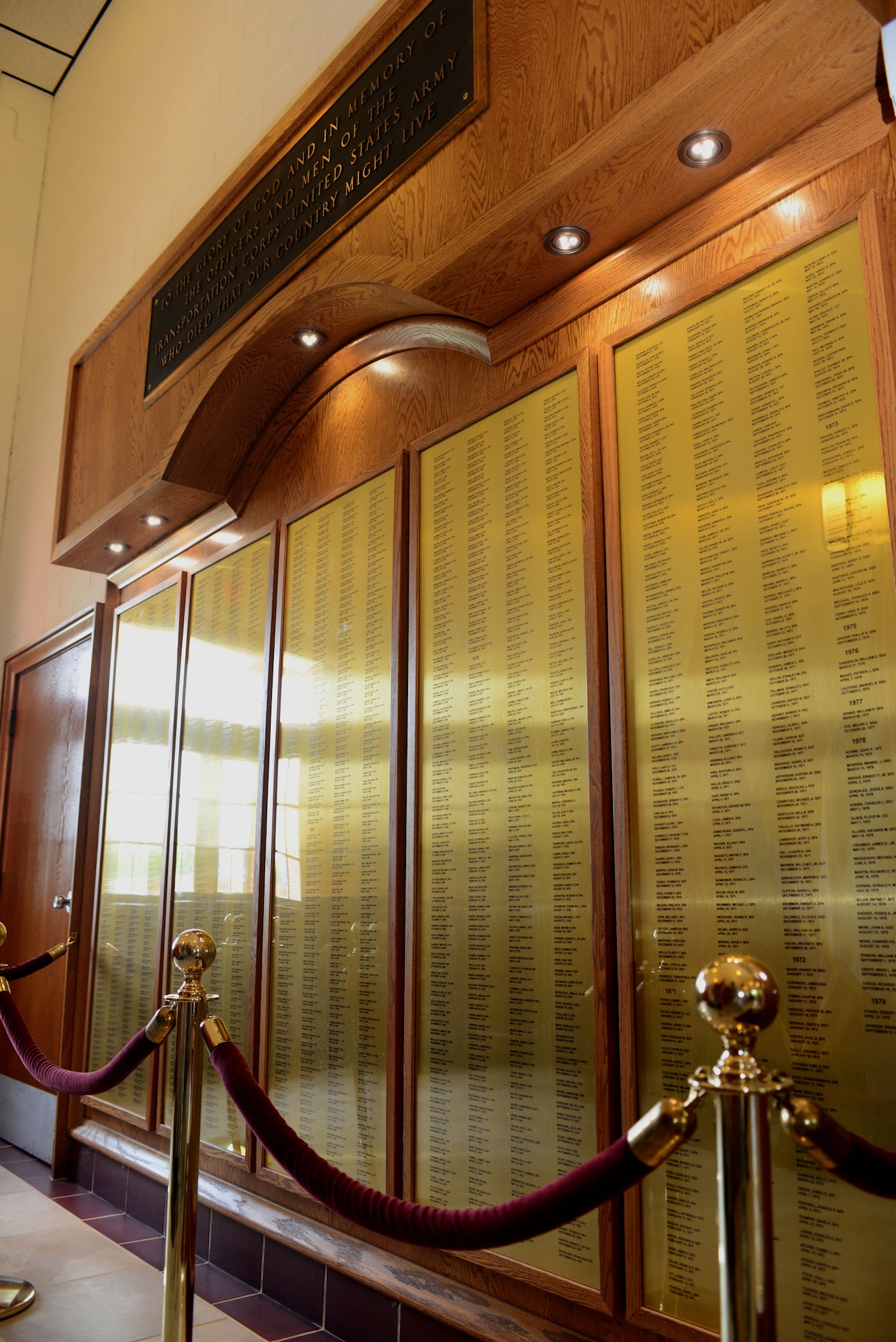 The U.S. Army Transportation Corps paid tribute to 47 fallen Soldiers during a Memorial Wall Rededication Ceremony at Fort Eustis, Va., May 21, 2014. The Memorial Wall is located in the Transportation Corps  Regimental Chapel and is inscribed with 1,972 names of Army transporters who gave their lives in the defense of freedom in conflicts ranging from the Vietnam War to Operations Iraqi and Enduring Freedom. (U.S. Air Force photo by Staff Sgt. Katie Gar Ward/Released) 