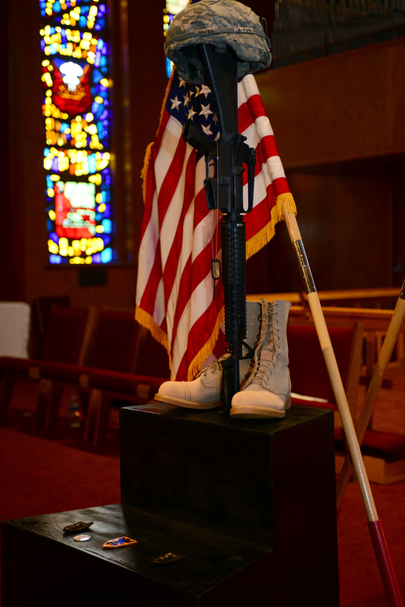The U.S. Army Transportation Corps paid tribute to 47 fallen Soldiers during a Memorial Wall Rededication Ceremony at Fort Eustis, Va., May 21, 2014. The rededication concluded with a ceremonial bell ringing as each of the 47 names added to the plaque were read aloud. Families, Soldiers and friends were able to render a final salute, paying tribute to the fallen Transportation Corps Soldiers. (U.S. Air Force photo by Staff Sgt. Katie Gar Ward/Released)