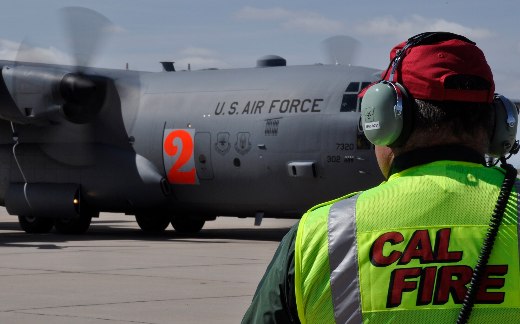 Several agencies took part in the annual Modular Airborne Fire Fighting System training May 16-20, 2014 at Peterson Air Force Base, Colo. Besides Reserve and Active duty Airmen, there are various support personnel. These included personnel from the Pueblo tanker base, the Pueblo Interagency dispatch, CalFire, U.S. Forest Service and the Bureau of Land Management. (U.S. Air Force photo/Master Sgt. Daniel Butterfield)