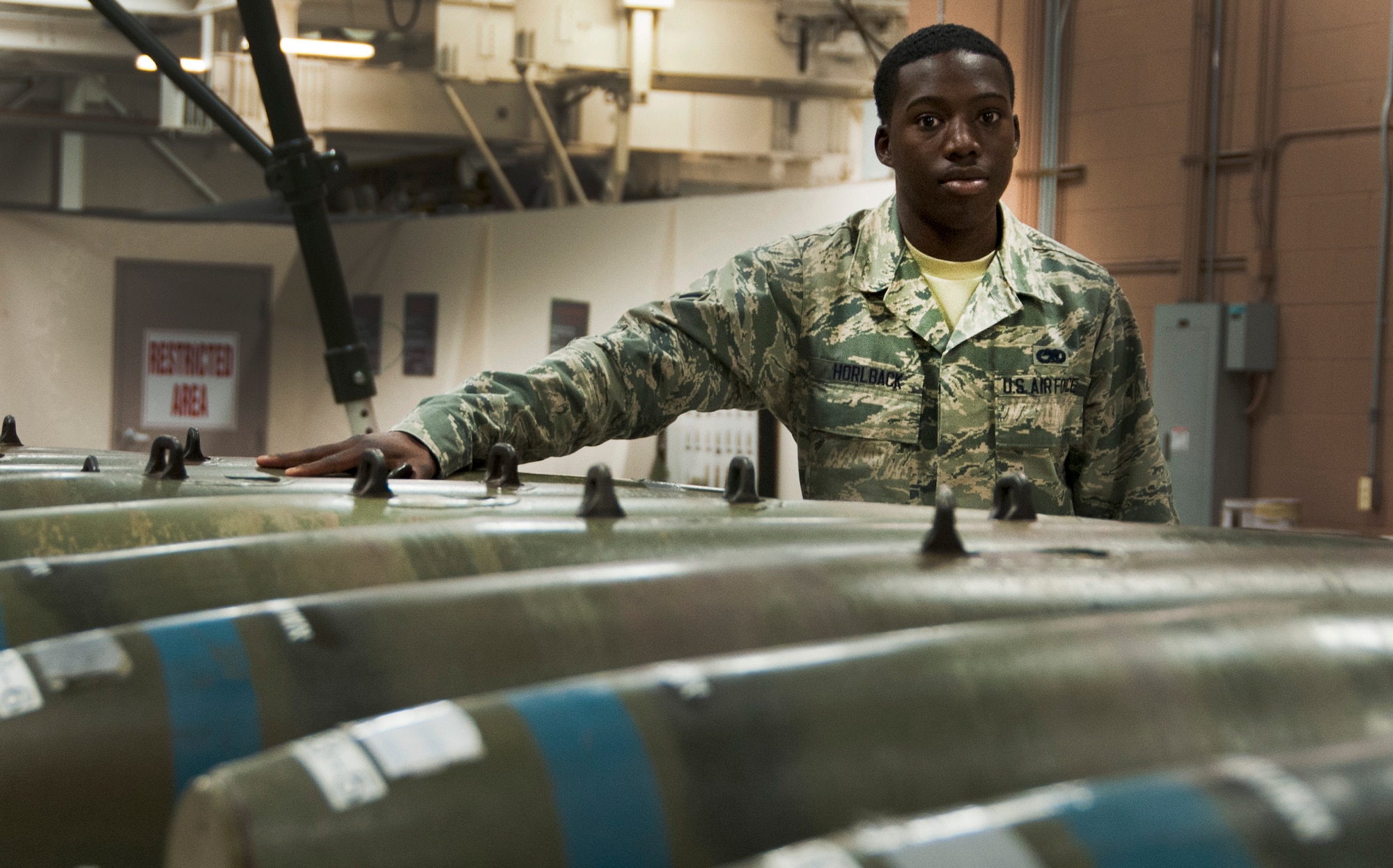 Airman 1st Class Kenneth Horlback, a 363rd Training Squadron munitions systems course graduate, earned the ACE award May 21, 2014, at Sheppard Air Force Base, Texas. The ACE award is given for maintaining a 100 percent average throughout each block test. (U.S. Air Force photo/Airman 1st Class Robert L. McIlrath) 