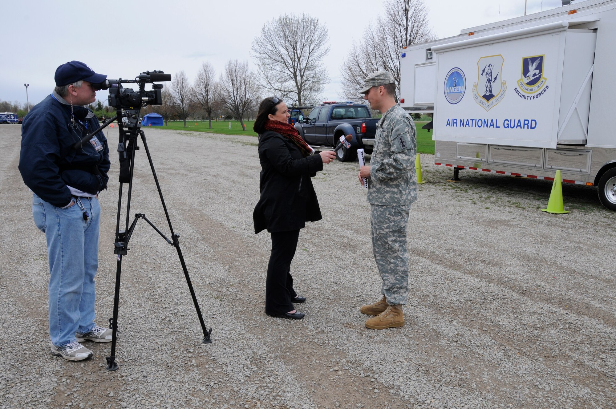Army Capt. Chris Robbins, Officer in Charge, Wisconsin National Guard Joint Operations Center, is interviewed by Emily Matesic, a reporter from WBAY-TV during SIMCOM 2014 at Sunnyview Expo Center in Oshkosh, Wis. May 15, 2014. SIMCOM (State Interoperable Mobile Communications) is a functional exercise designed to test the interoperability of federal, state, county, tribal, volunteer, private organizations and defense communications and data sharing. Air National Guard photo by Tech. Sgt. Todd Pendleton (Released)
