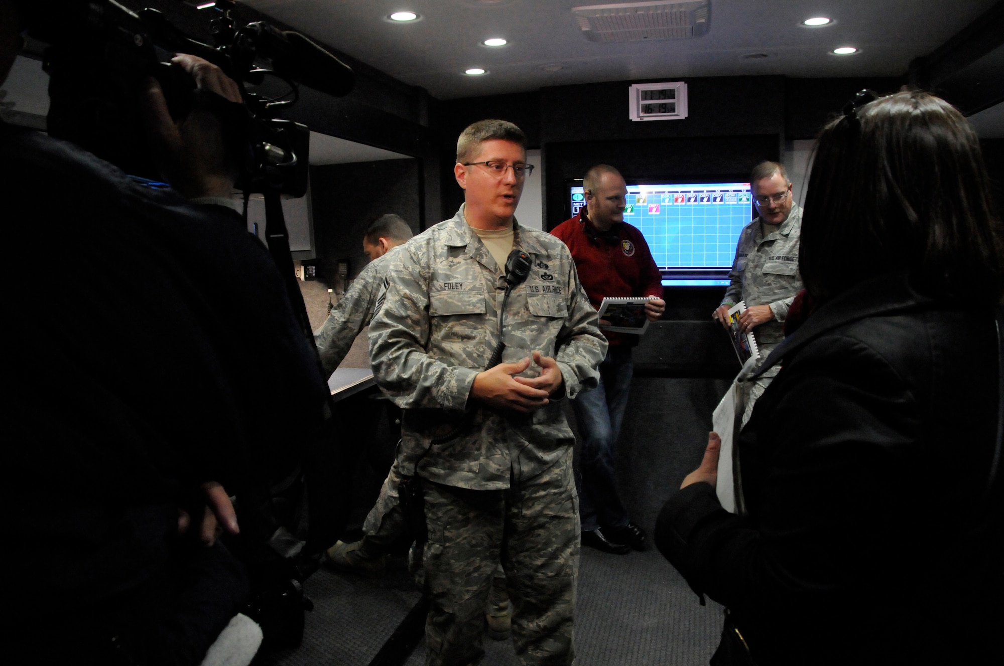 Air Force Senior Master Sgt. Tim Foley, Installation Emergency Manager of 182nd Airlift Wing, Peoria, Ill., is interviewed by Emily Matesic, a reporter from WBAY-TV during SIMCOM 2014 at Sunnyview Expo Center in Oshkosh, Wis. May 15, 2014. SIMCOM (State Interoperable Mobile Communications) is a functional exercise designed to test the interoperability of federal, state, county, tribal, volunteer, private organizations and defense communications and data sharing. Air National Guard photo by Tech. Sgt. Todd Pendleton (Released)