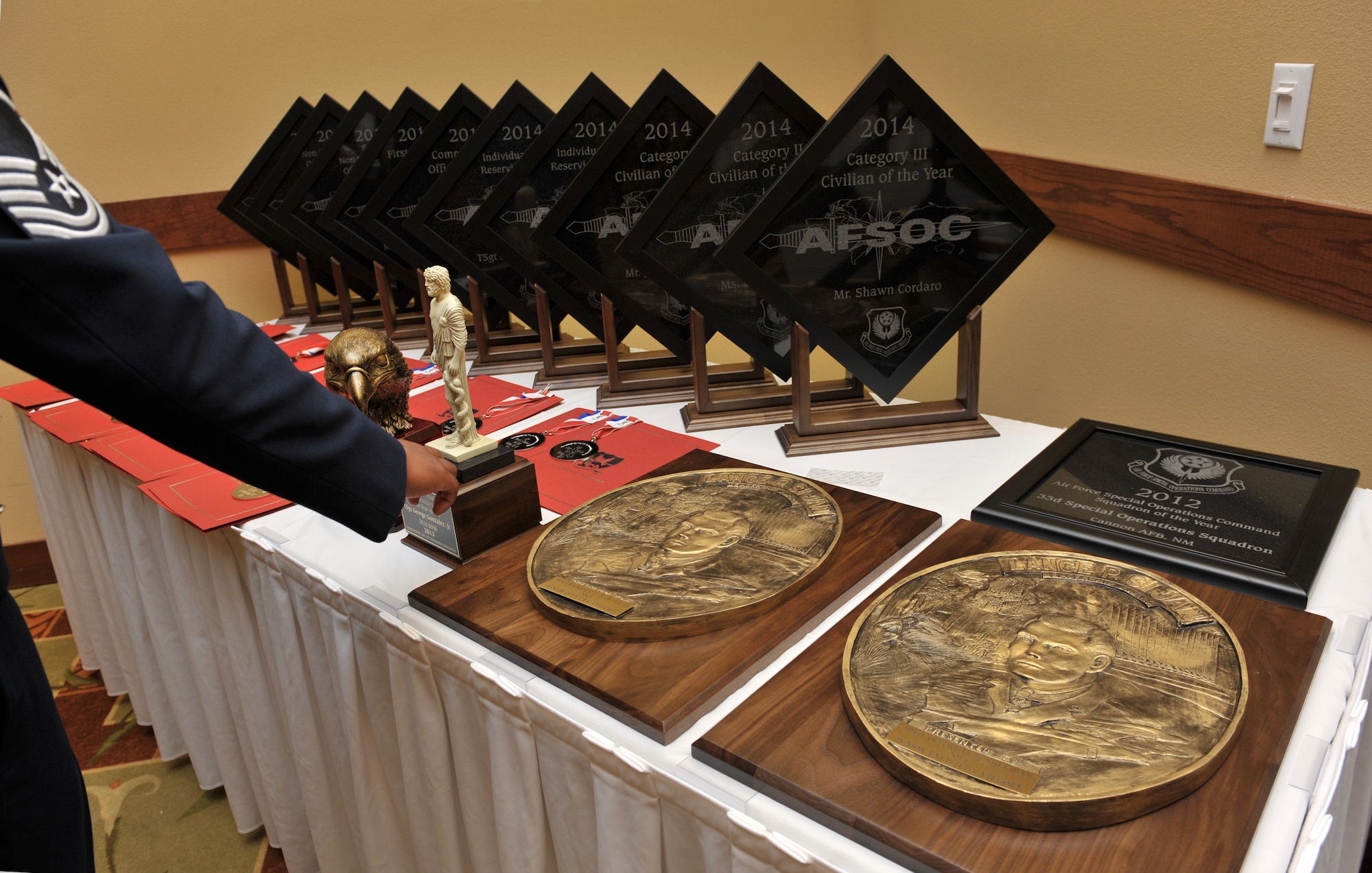 Awards sit on display at the Soundside Club on Hurlburt Field, Fla., May 15, 2014. The Air Force Special Operations Command Outstanding Airmen of Year, Lance P. Sijan and various other awards were presented during the 2014 Outstanding Airmen of the Year Award Banquet. (U.S. Air Force photo/Senior Airman Kentavist P. Brackin) 