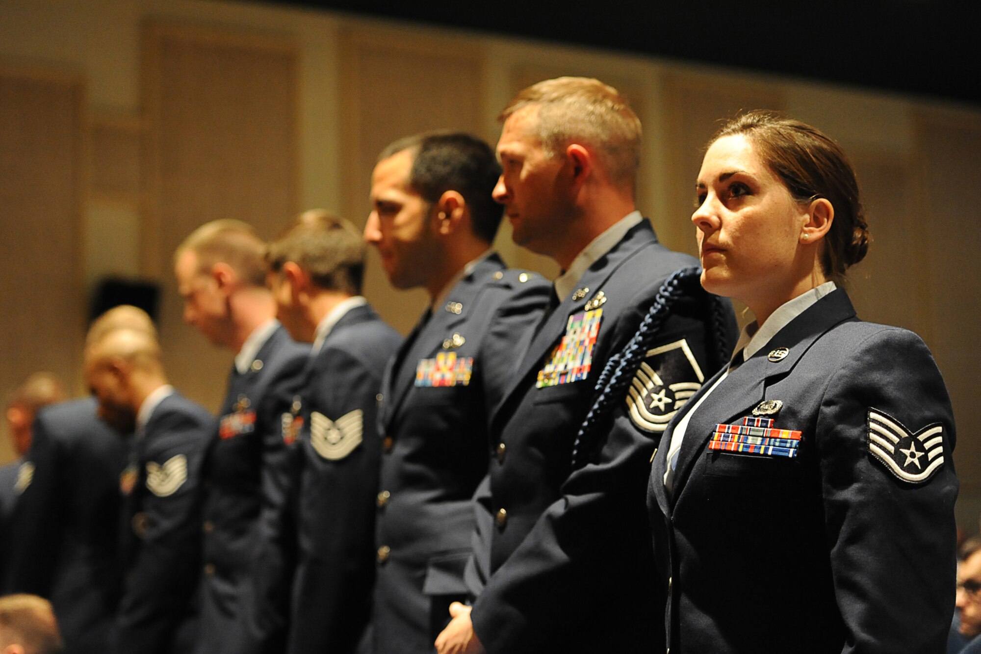 GOODFELLOW AIR FORCE BASE, Texas – Community College of the Air Force graduates prepare to receive their degrees at the base theater here May 16. Some Goodfellow members received their second CCAF degree. (U.S. Air Force photo/ Airman 1st Class Devin Boyer)