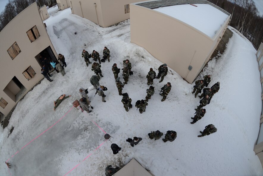 JOINT BASE ELMENDORF-RICHARDSON, Alaska -- 176 and 477th Security Forces Squadron members train together here April 11, 2014, during the Polar Guard 14-1 exercise. U.S. Air Force photo by Tech. Sgt Dana Rosso/ Released