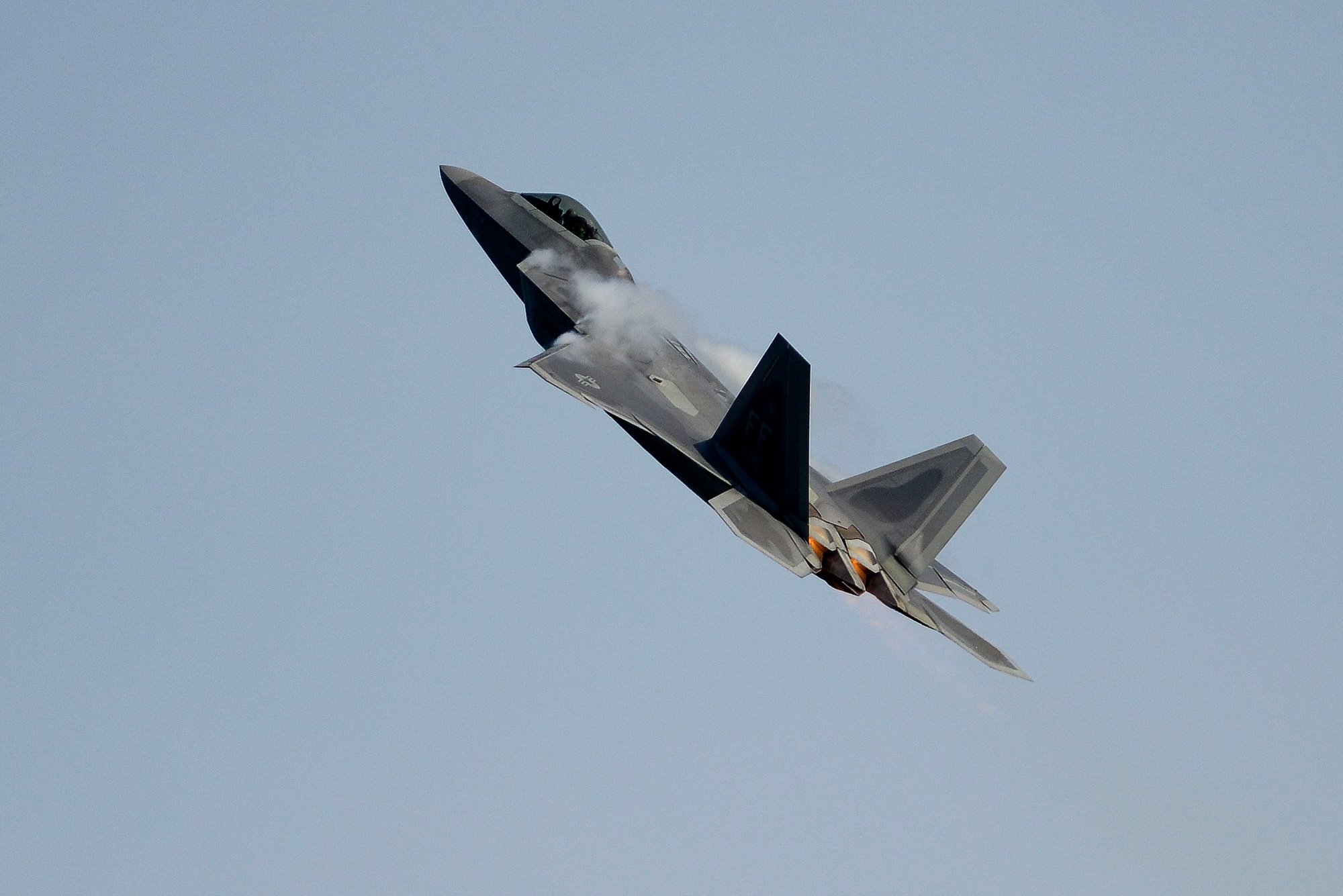 U.S. Air Force Capt. John “Taboo” Cummings, 1st Fighter Wing F-22 Raptor pilot, performs a solo demonstration for local media outlets at Langley Air Force Base, May 21, 2014. Cummings executed precision aerial maneuvers, showing the unique capabilities of the world’s only operational fifth-generation fighter aircraft. (U.S. Air Force photo by Senior Airman Kayla Newman/Released) 