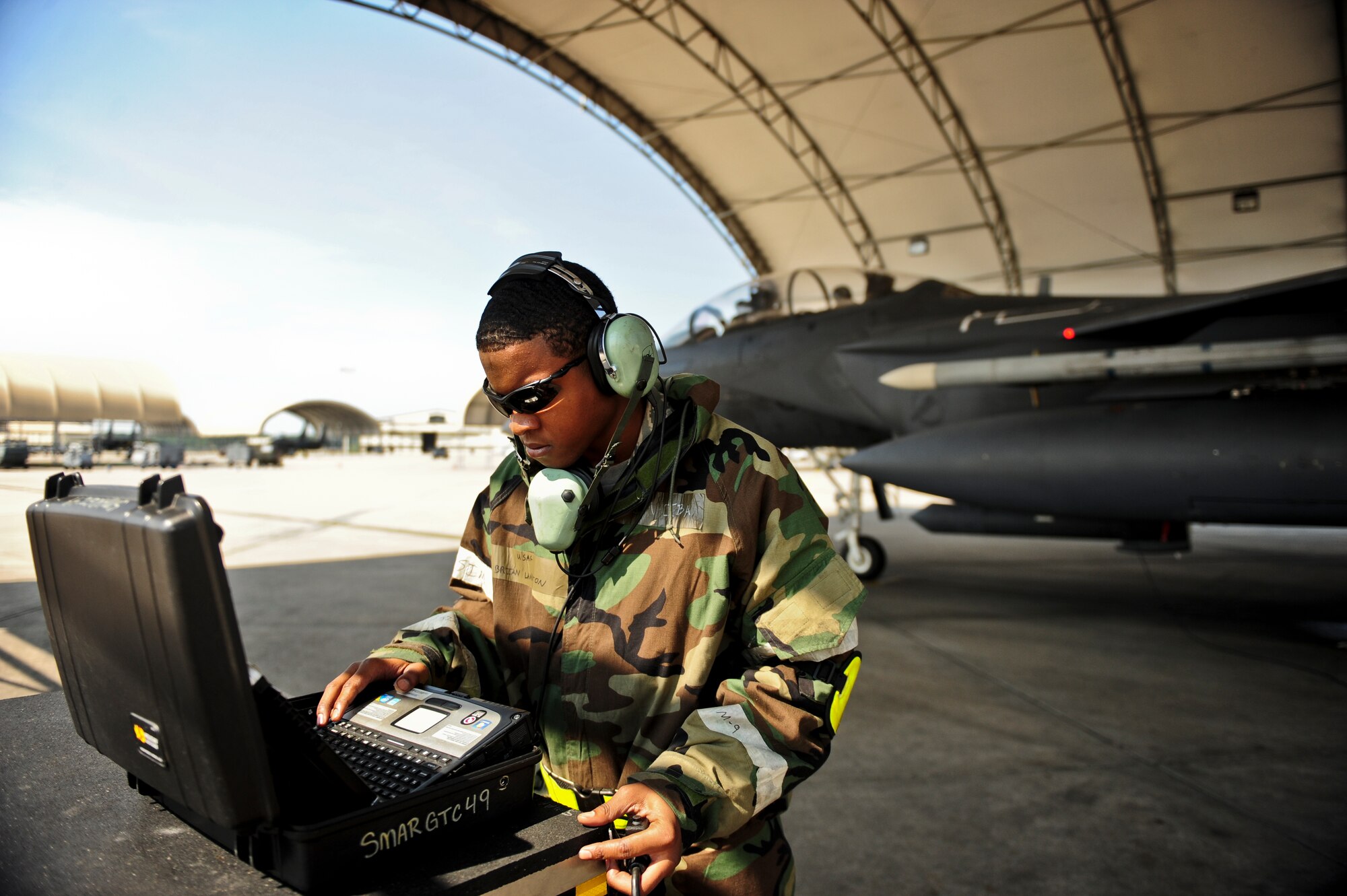 Senior Airman Brian Langston, 4th Aircraft Maintenance Squadron crew chief, reviews a technical order to ready an F-15E Strike Eagle aircraft for launch during Employment Exercise CORONET WARRIOR 14-02, May 20, 2014, at Seymour Johnson Air Force Base, North Carolina. Employment Exercises ensure Airmen are prepared to support overseas contingency operations and effectively complete the mission of the 4th Fighter Wing: to provide Strike Eagle airpower, whenever and wherever it is needed in defense of our nation. (U.S. Air Force photo/Airman 1st Class Brittain Crolley)