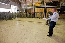 Col. Robert A. Meyer Jr., 108th Wing Commander, announces the Air Mobility Command Inspector General team's inspection results to members of the 108th Wing, New Jersey Air National Guard, May 21, 2014 at Joint Base McGuire-Dix-Lakehurst, N.J. The Wing underwent a Unit Effectiveness Inspection, which began on May 14 and ended May 18. Highly effective is the second highest grade a unit can receive in a UEI and it is the highest grade that has been given to date in this new inspection system. The UEI is part of the new Air Force Inspection System, which places a priority on continuous unit readiness verified by self-inspection and wing-based inspections. (U.S. Air National Guard photo by Master Sgt. Mark C. Olsen/Released)