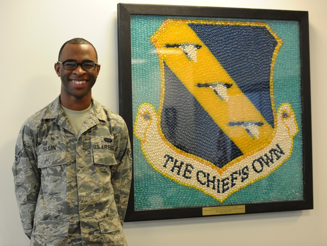 Airman 1st Class Quachardd Sloan, 11th Security Forces Squadron knowledge management apprentice, has been recognized as Joint Base Andrews Warrior of the Week, May 21. Sloan has been recognized for his hard work for overseeing the relocation and transition of more than twenty defenders in-processing to the unit from technical training. (U.S Air Force photo/ Senior Airman Nesha Humes)