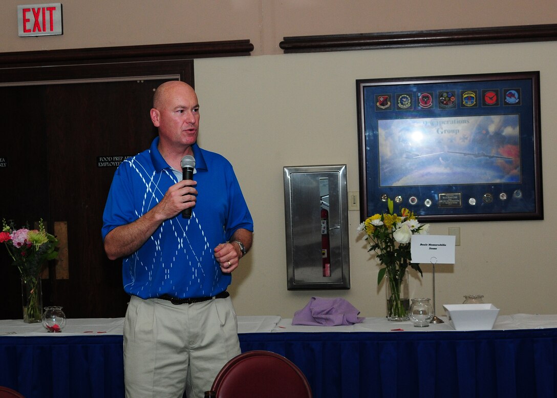 Col. Quinn Gummel, 9th Reconnaissance Wing vice commander, speaks to participants of the Beale Military Liaison Committee golf tournament at the Recce point Club on Beale Air Force Base, Calif., May 16, 2014. The four-person, best-ball tournament strengthened ties between the base and local community leaders and provided an opportunity for new honorary commanders to build rapport with their military counterparts. (U.S. Air Force photo by Senior Airman Allen Pollard/Released)