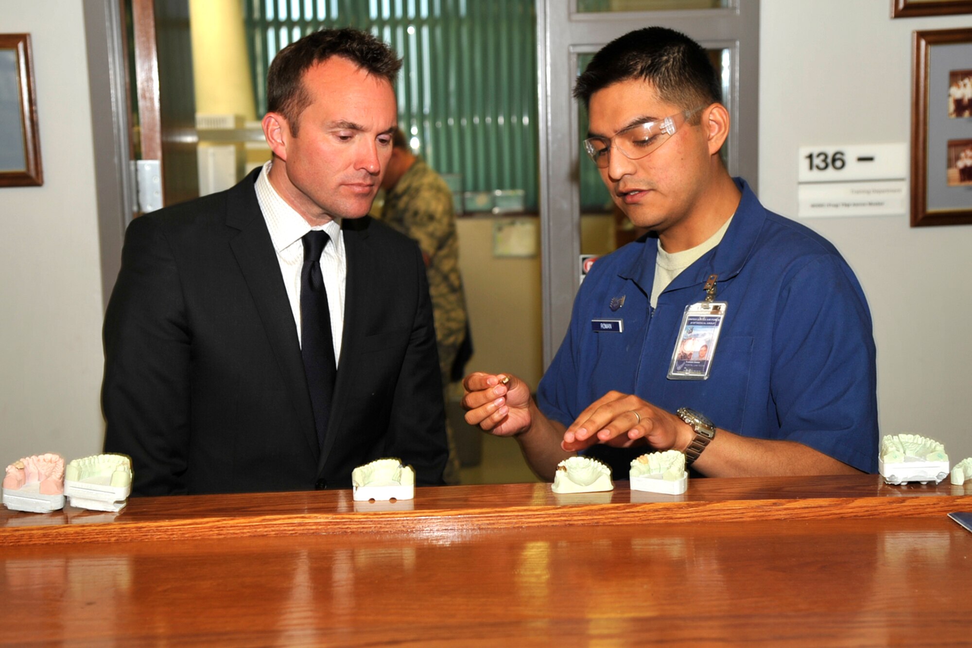 PETERSON AIR FORCE BASE, Colo. – Undersecretary of the Air Force Eric Fanning receives an educational tour of the Area Dental Laboratory during his visit here May 19. While here Fanning visited various facilities including the explosive ordnance disposal flight and military working dog section, to gain insight into the day-to-day lives of Airmen. (U.S. Air Force photo/Robb Lingley)