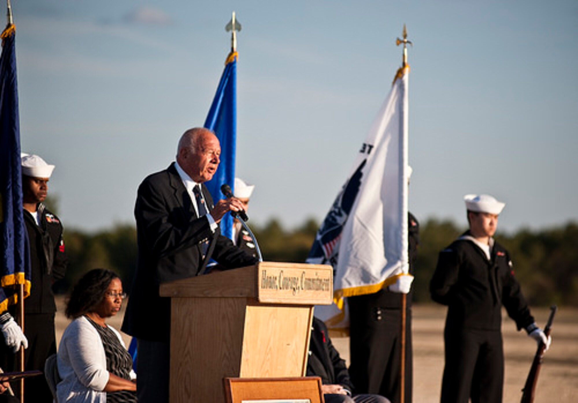 Dr. Horst Schimer addresses an audience during annual Hindenburg Memorial Ceremony May 6, 2014, at Joint Base McGuire-Dix-Lakehurst, N.J. Shimer, whose father helped design the Hindenburg airship and participated in a test flight at the age of 5, spoke about the accomplishments of the airship and his personal experiences during the event that commemorated the 77th anniversary of the tragic accident. (U.S. Air Force photo by Staff Sgt. Scott Saldukas/Released)  