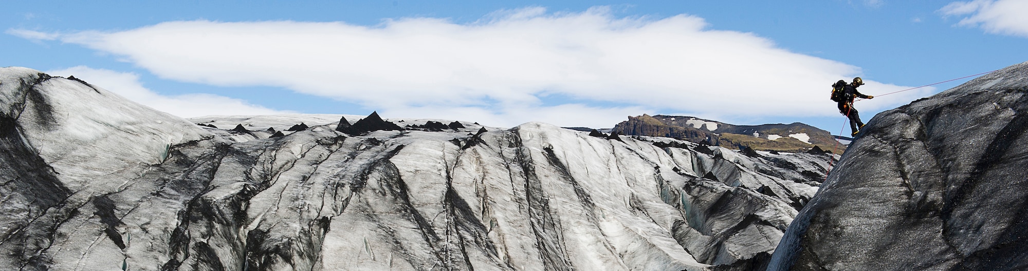 KEFLAVIK, Iceland -- A pararescueman deployed for Icelandic Air Policing rappels down the side of a glacier during training near Keflavik, Iceland, May 18, 2014. Although the Airman’s primary objective is to rescue downed aircrew deployed with the 48th Air Expeditionary Group if needed, the trip provides an opportunity to accomplish training objectives the rescue team wouldn’t ordinarily have access to near Kadena Air Base, Japan, from where they are deployed. (U.S. Air Force photo/Tech. Sgt. Benjamin Wilson) (Released)
