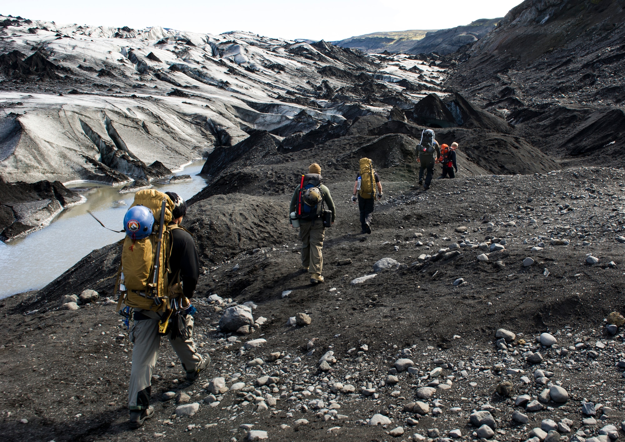 KEFLAVIK, Iceland -- Pararescueman deployed for Icelandic Air Policing walk toward a glacier near Keflavik, Iceland, May 18, 2014. Although the Airmen’s primary objective is to rescue downed aircrew deployed with the 48th Air Expeditionary Group if needed, the trip provides an opportunity to accomplish training objectives the team wouldn’t ordinarily have access to near Kadena Air Base, Japan, from where they are deployed. (U.S. Air Force photo/Tech. Sgt. Benjamin Wilson) (Released)
