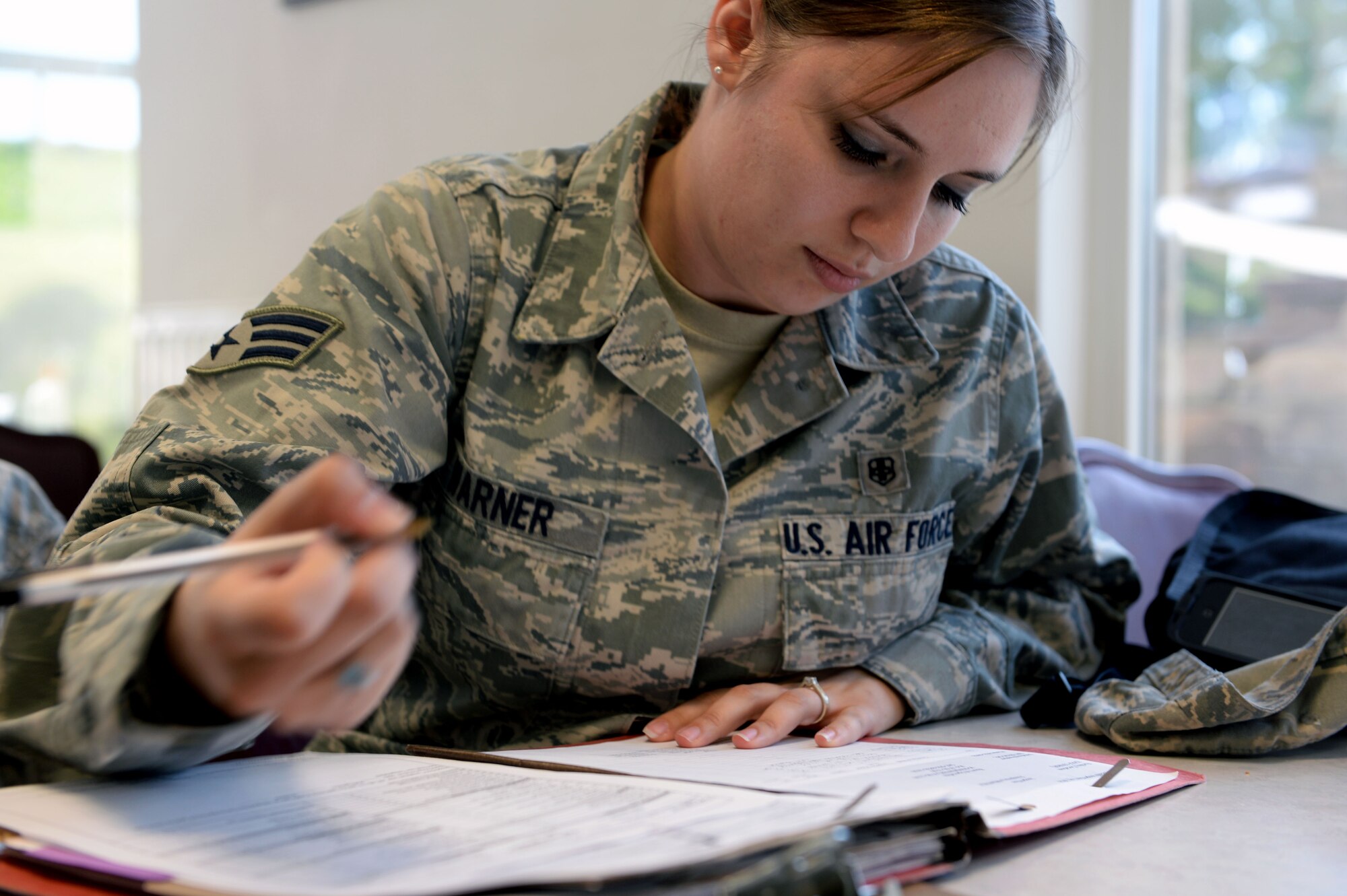 U.S. Air Force Senior Airman Misty Warner, 52nd Aerospace Medicine Squadron public health food safety and sanitation technician from Oglesby, Texas, prepares for a monthly health inspection at the Eifel Mountain Golf Course at Spangdahlem Air Base, Germany, May 20, 2014. Health inspectors routinely ensure the cleanliness and safety of all base food-serving establishments. (U.S. Air Force photo by Senior Airman Alexis Siekert/Released)