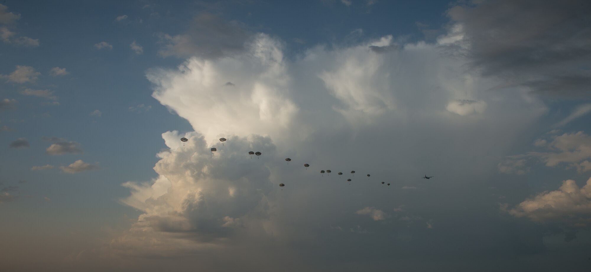 U.S. Air Force Maj. Jeff Bliss, a Grand Rapids, Michigan native and Capt. Brett Polage, a Mount Vernon, Indiana native, 37th Airlift Squadron pilots, take off in a C-130J Super Hercules over an Estonian runway filled with American and Estonian paratroopers, May 19, 2014. Pilots and loadmasters from the 37th AS alongside an 86th Aircraft Maintenance Squadron crew chief spent four days across three Baltic countries assisting in personnel drops of allied partners and American service members. (U.S. Air Force photo/Airman 1st Class Jordan Castelan)