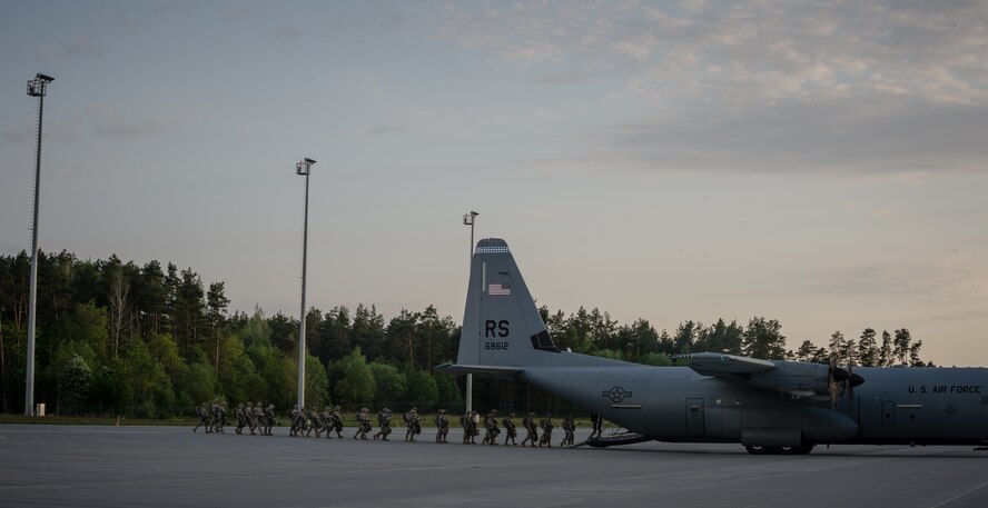U.S. Army paratroopers from the 173rd Infantry Brigade Combat Team Airborne board a C-130J Super Hercules on an Estonian Runway, May 19, 2014.Pilots and loadmasters from the 37th AS alongside an 86th Aircraft Maintenance Squadron crew chief spent four days across three Baltic countries assisting in personnel drops of allied partners and American service members. (U.S. Air Force photo/Airman 1st Class Jordan Castelan)