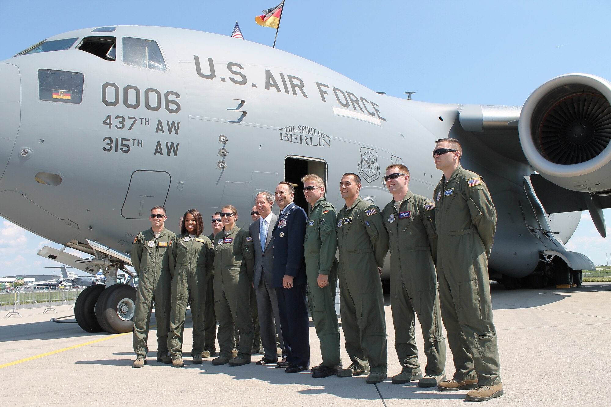 U.S. Air Force C-17 Globemaster III “Spirit of Berlin” aircrew members gather with Lt. Gen. Noel “Tom” Jones, vice commander, U.S. Air Forces in Europe and Air Forces Africa, and the Honorable John Emerson, Ambassador to the Federal Republic of Germany, at this year’s Berlin Trade and Air Show, Berlin, May 20, 2014.  The trade show, which is held every two years, represents a unique opportunity for U.S. and military allies to showcase their leadership in aerospace technologies and to show spectators the type of equipment being used by the U.S. that is critical to the success of current and future military operations. (U.S. Air Force photo/ 2nd Lt. Clay Lancaster)