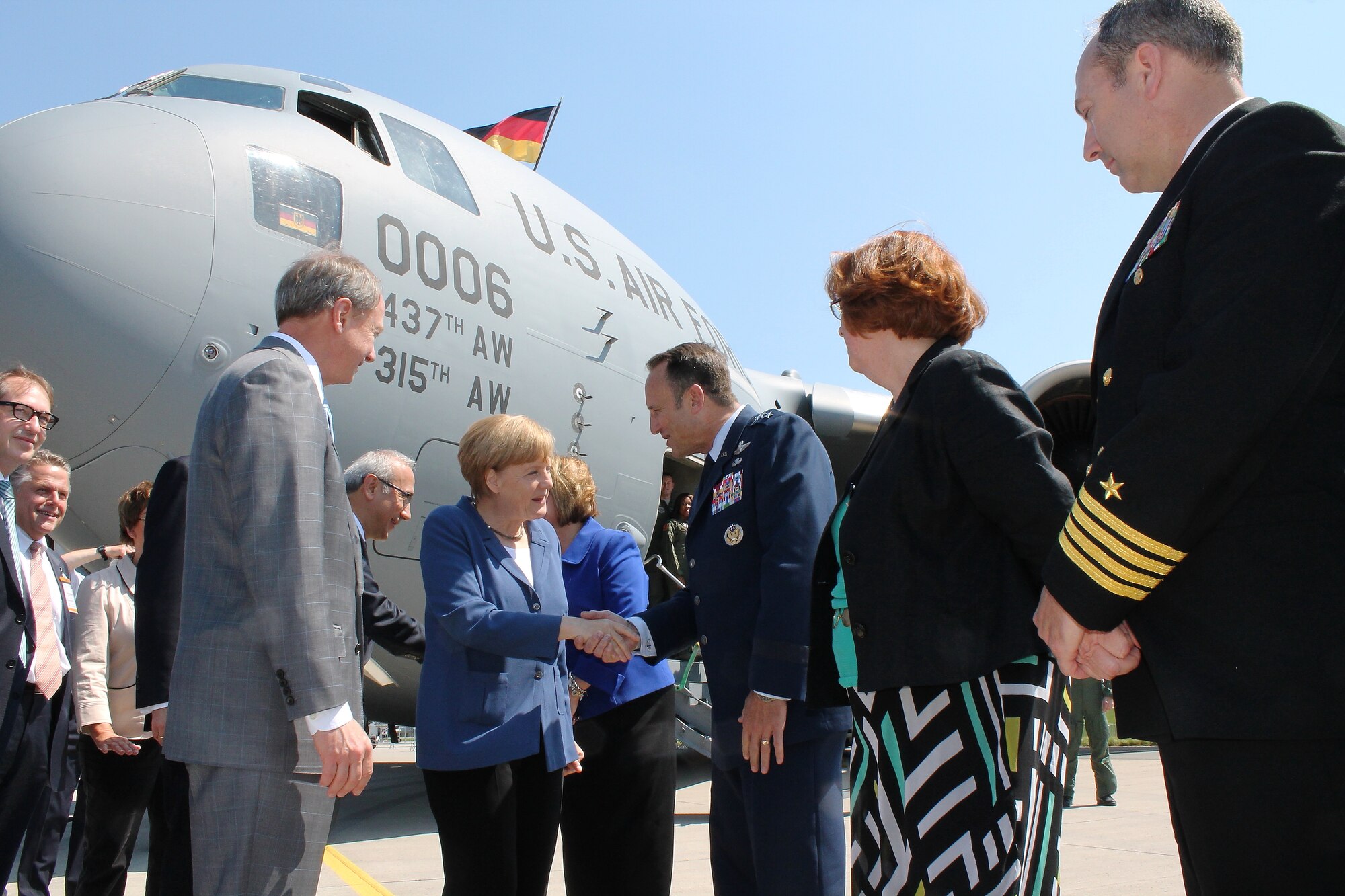 U.S. Air Force Lt. Gen. Noel “Tom” Jones, vice commander, U.S. Air Forces in Europe and Air Forces Africa, greets German Chancellor Angela Merkel at this year’s Berlin Trade and Air Show, Berlin, May 20, 2014.  Chancellor Merkel attended the opening ceremony of the international event and visited with U.S. airmen who were crew members of the C-17 Globemaster III “Spirit of Berlin”.  The U.S. presence at ILA this year demonstrates a commitment to interoperability with allies and the U.S. defense industry’s state-of-the-art capabilities that is vital for the support and protection of national security interests throughout Europe and other regions. (U.S. Air Force photo/ 2nd Lt. Clay Lancaster)