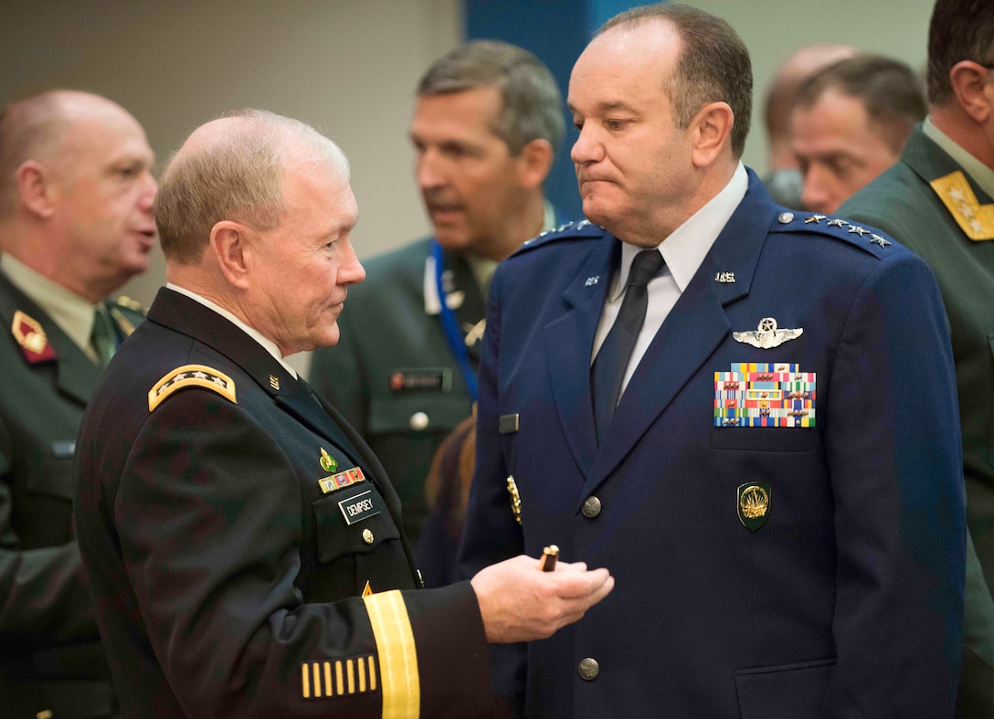 U.S. Army Gen. Martin E. Dempsey, left, chairman of the Joint Chiefs of ...