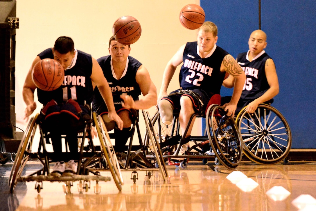 Members of the Naval Medical Center San Diego wheelchair basketball team, Wolfpack, do pace drills during a team practice in San Diego, Dec. 1, 2012. Made up of 13 military and civilian members, Wolfpack is one of 10 teams in the West Coast Conference of the National Wheelchair Basketball Association with a record of 8-2.  
