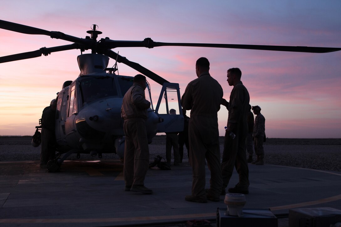 U.S. Marines assigned to Marine Light Attack Helicopter Squadron 169, Marine Aircraft Group 39, 3rd Marine Aircraft Wing (Forward), land at Camp Dwyer, Helmand province, Afghanistan, Nov. 27, 2012. HMLA-169 conducted Operation Aero Hunter in Southern Helmand. 
