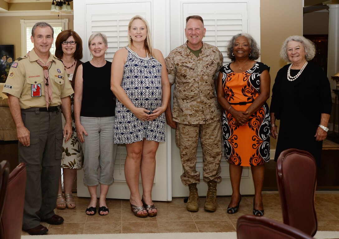 The Officers’ Spouses Club presents grants to five non-profit organizations during a tea held at the home of Marine Corps Logistics Command’s Commanding General Maj. Gen. John J. Broadmeadow and his wife, Karen, May 13. The organizations included the Boy Scouts of America Troop 3 Chehaw council, Flint River Habitat for Humanity, NECCO, Communities in schools of Albany/Dougherty County and the Semper Fi Fund.