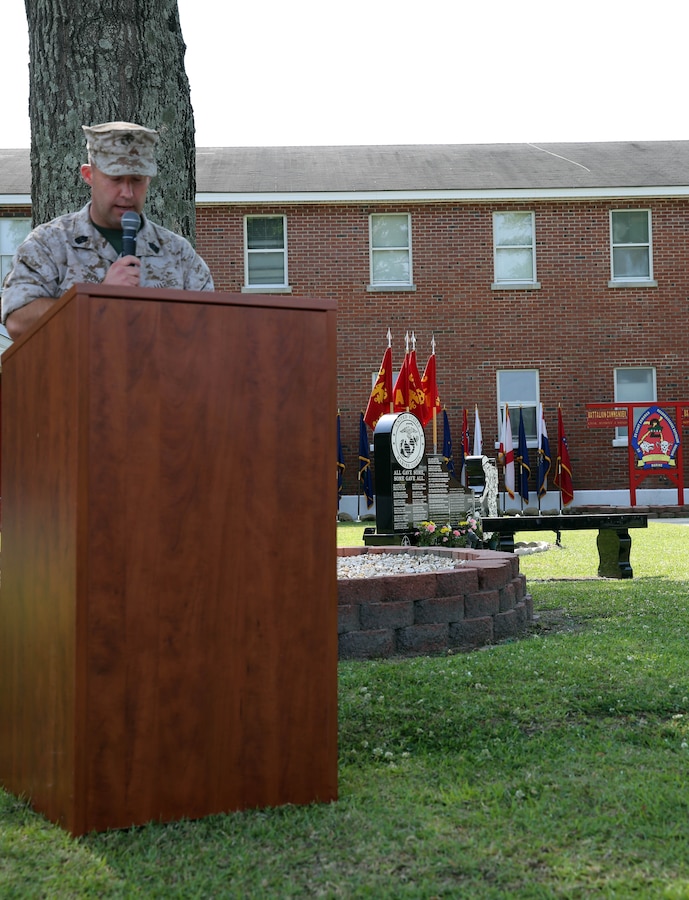 Sergeant Maj. Kenneth Bohn, sergeant major of 2nd Light Armored Reconnaissance Battalion, 2nd Marine Division, reads the roll call of fallen Marines from the battalion during a memorial service held at the battalion headquarters aboard Marine Corps Base Camp Lejeune, N.C., May 21, 2014. The service was a way for Marines, sailors and guests to memorialize their fallen brothers in arms, friends and family.

