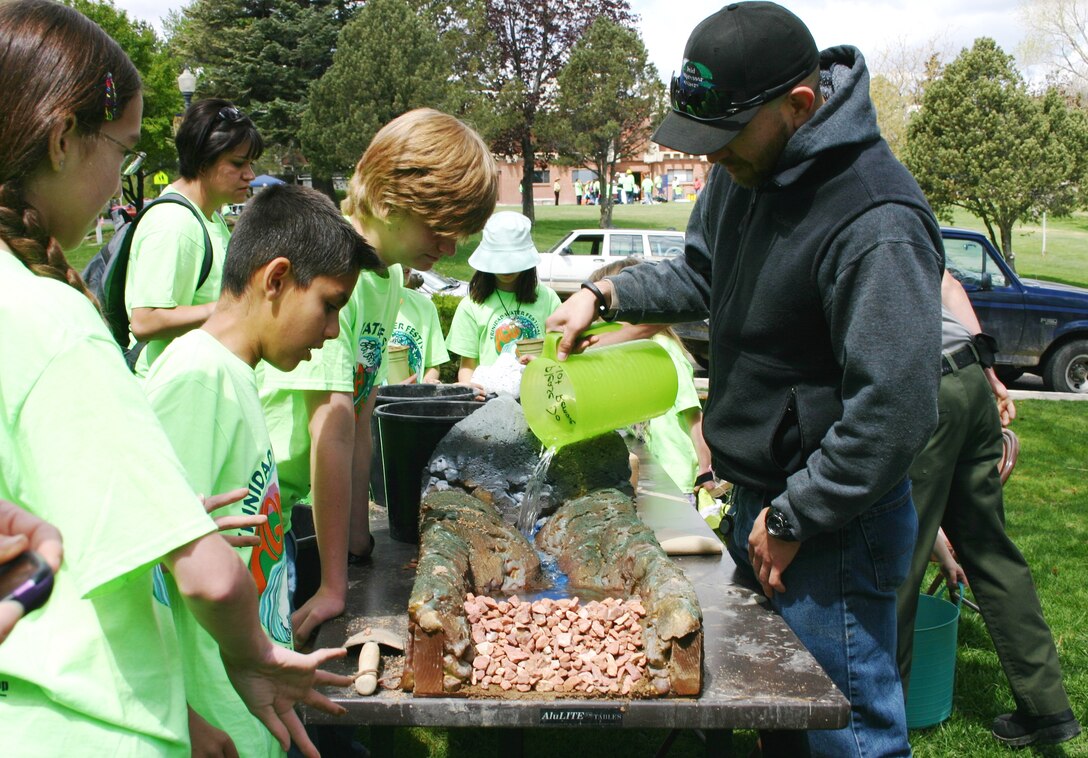 TRINIDAD, COLO., -- Trinidad students learn about dams at the District’s “Dam Building 101” station at the Trinidad Water Festival, May 15, 2014.