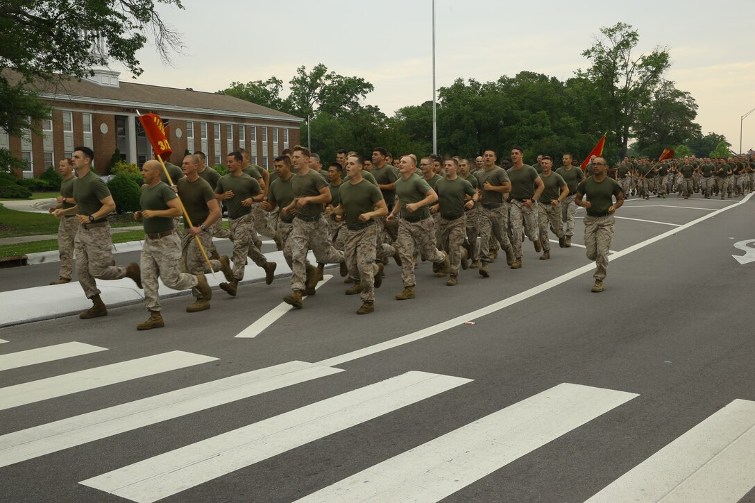 Marines and sailors with 2nd Marine Division participated in a run to build unit camaraderie aboard Marine Corps Base Camp Lejeune, N.C., May 22, 2014. More than 10,000 individuals comprised one large formation streching more than a mile in length.