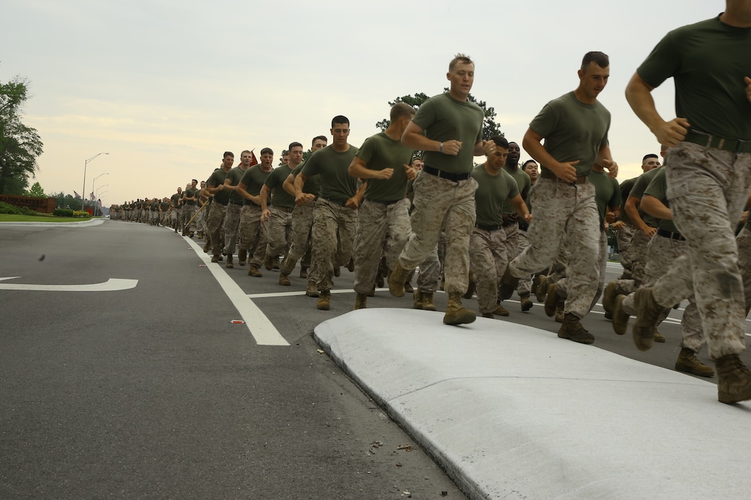 Marines and sailors with 2nd Marine Division participated in a run to build unit camaraderie aboard Marine Corps Base Camp Lejeune, N.C., May 22, 2014. More than 10,000 individuals comprised one large formation streching more than a mile in length.