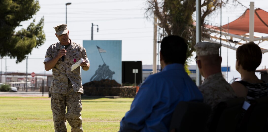 Colonel Bradford Gering, former Commanding Officer of Marine Aviation Weapons and Tactics Squadron 1, based out of Marine Corps Air Station Yuma, Ariz., gives his farewell speech during a change of command ceremony aboard the station’s parade deck, Thursday. Gering was commissioned as a 2nd Lieutenant in 1989, and has spent four tours at MCAS Yuma during his career.