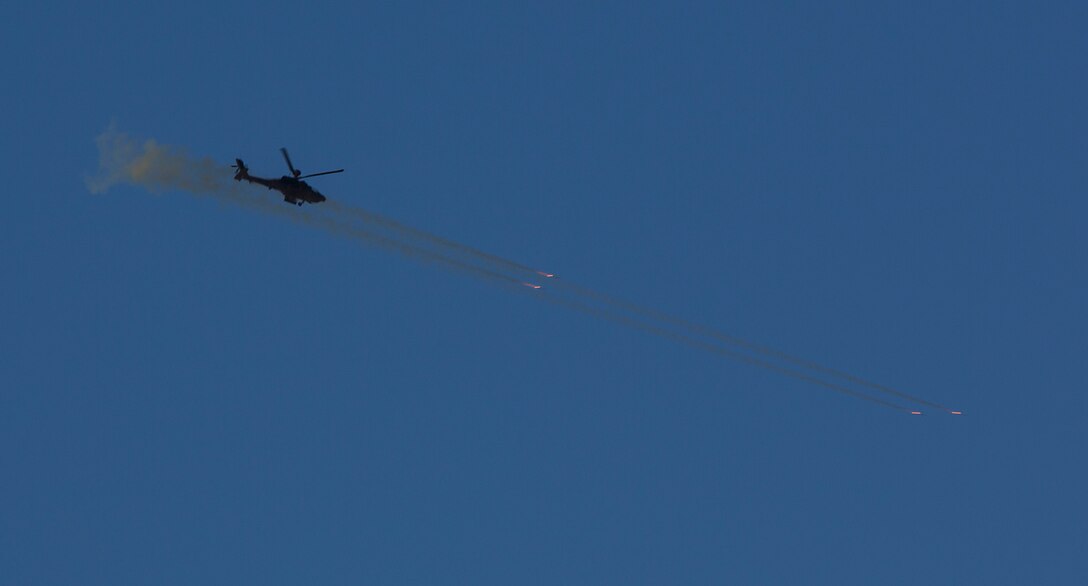 A United Kingdom Army AH-64 Apache helicopter destroys its target point with CRV7 rockets and gunfire at the Barry M. Goldwater Range, located in Southern Arizona, in part of the UK’s Crimson Eagle training exercise, May 3.  