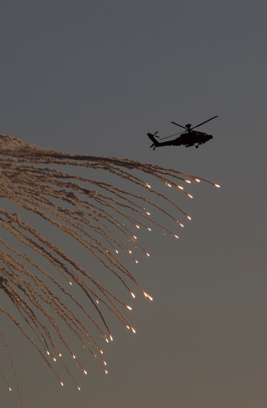 A United Kingdom Army AH-64 Apache helicopter destroys its target point with CRV7 rockets and gunfire at the Barry M. Goldwater Range, located in Southern Arizona, in part of the UK’s Crimson Eagle training exercise, May 3.  