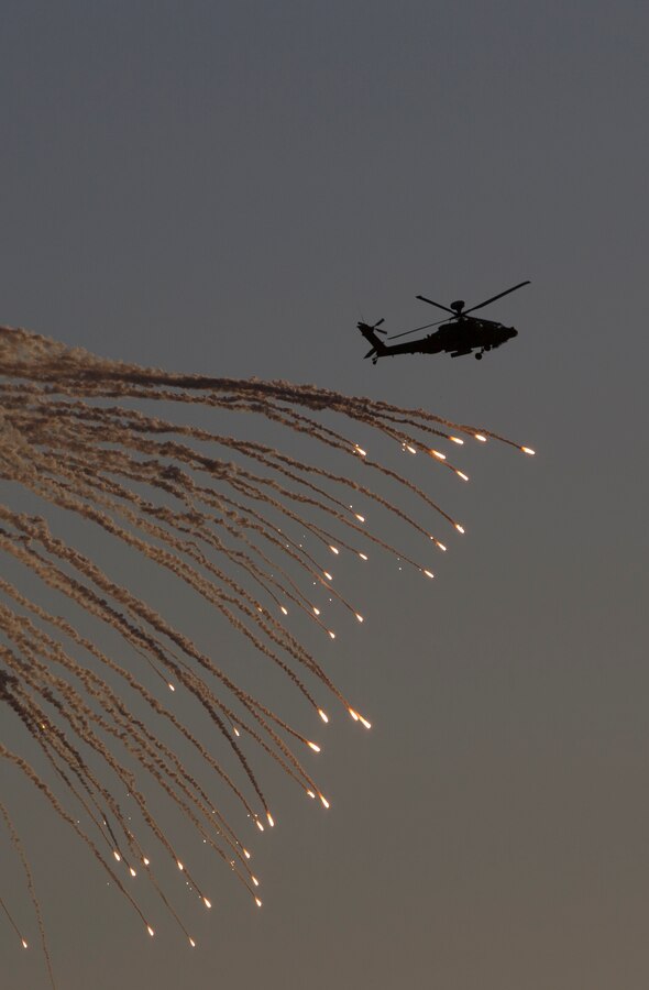A United Kingdom Army AH-64 Apache helicopter destroys its target point with CRV7 rockets and gunfire at the Barry M. Goldwater Range, located in Southern Arizona, in part of the UK’s Crimson Eagle training exercise, May 3.  