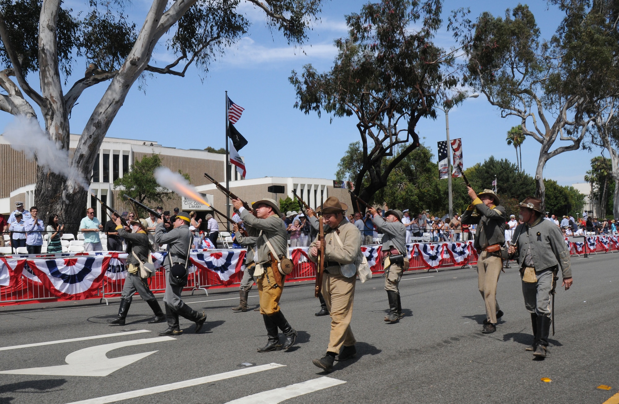 Members of the first North Carolina Calvary Civil War re-enactors fire their rifles during the annual Torrance Armed Forces Day parade, May 17. (Photo by Joe Juarez) 