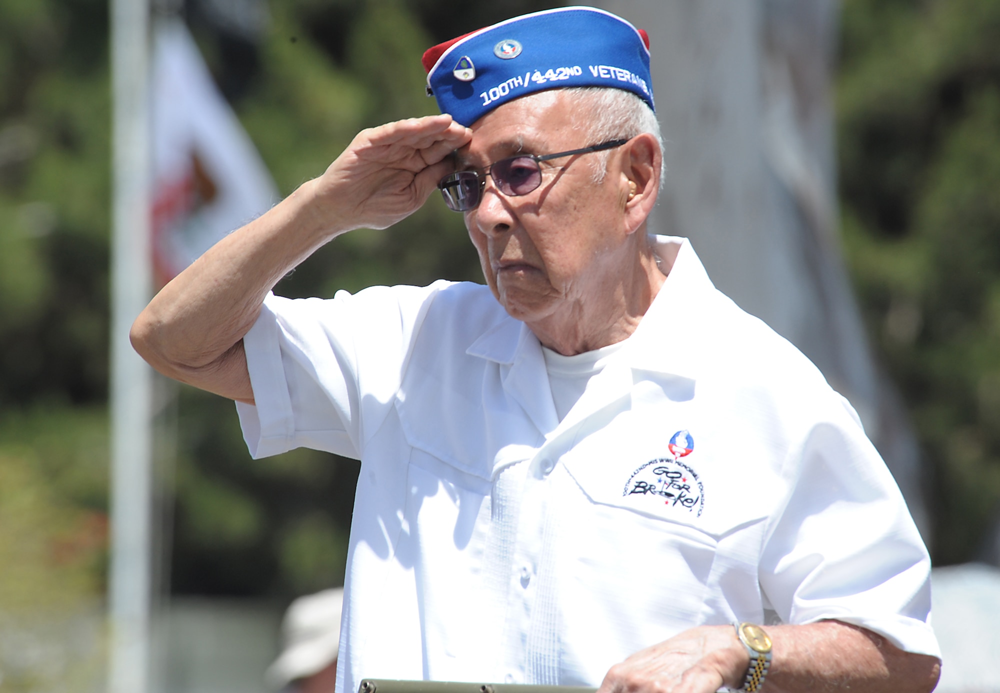A member of the 100th/442nd Veterans Assoc. salutes the reviewing stand during the annual Torrance Armed Forces Day parade, May 17.  Seeing combat during World II, the unit was almost entirely comprised of Japanese American soldiers. (Photo by Joe Juarez) 