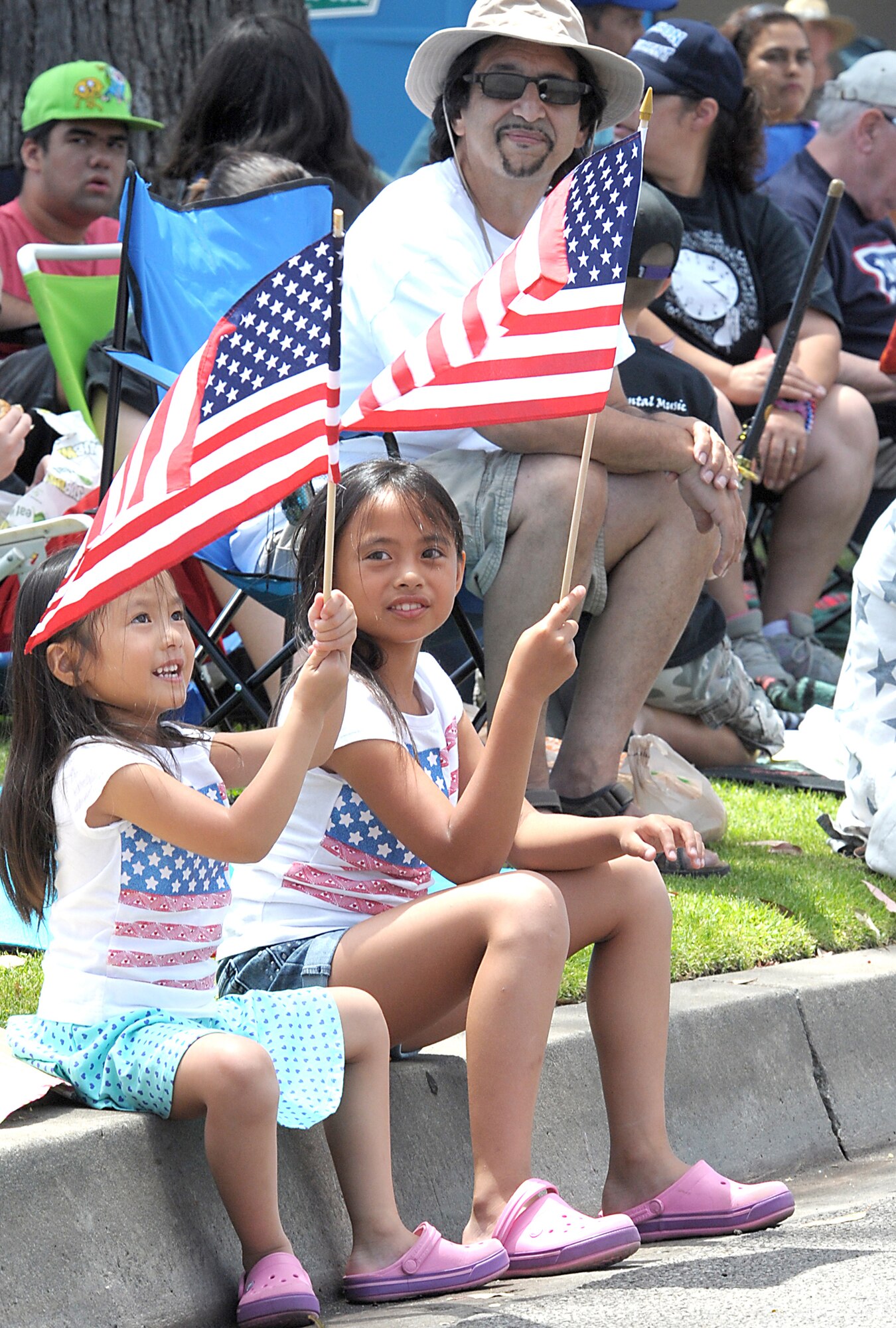 Spectators show their patriotic spirit during the annual Torrance Armed Forces Day parade, May 17. (Photo by Joe Juarez) 