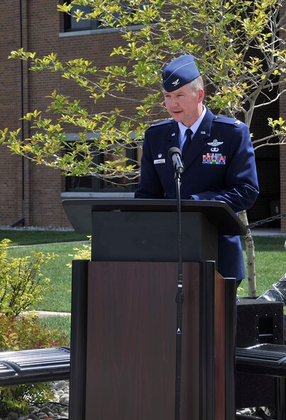 Col. William Thomas speaks to Airmen and community members in attendance at the official ribbon cutting ceremony for the new 336th Training Group headquarters building at Fairchild Air Force Base, Wash., May 21, 2014. Thomas has been the 336th TRG commander since June 2012. (U.S. Air Force photo by Senior Airman Mary O'Dell/Released)