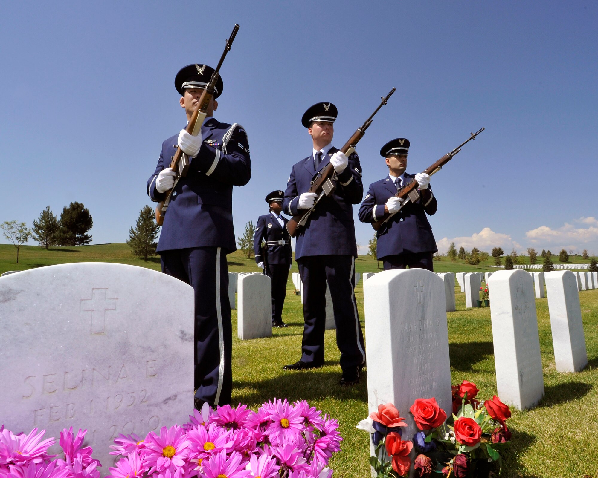 U.S. Air Force Mile High Honor Guard Airmen render a three volley salute during military funeral honors July 11, 2012, at Fort Logan National Cemetery in Denver. The base honor guard performs final military honors at nearly 570 funerals per year and is the face of the United States Air Force to many families who have lost their loved ones. (U.S. Air Force photo by Tech. Sgt. Wolfram Stumpf/Released)