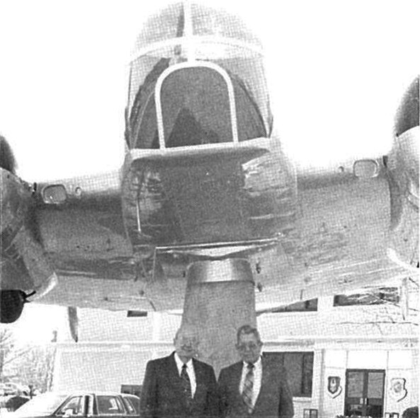 Harry Livingston and Claude Edwards, World War II veterans, visit Headquarters 22nd Air Force's new static display of the AT-11 Kansan in May 1994. Livingston flew the AT-11 during the second world war. (U.S. Air Force photo/P. Nicole Brown)