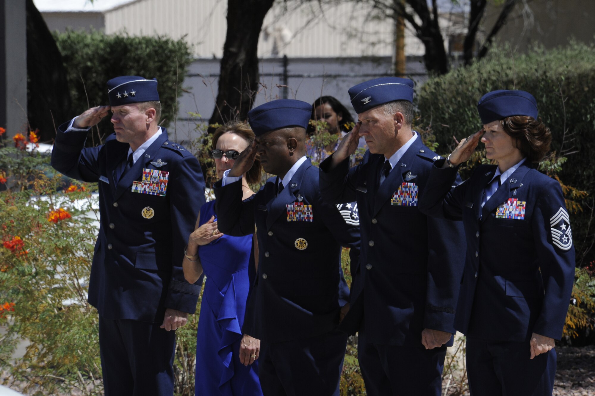 Twelfth Air Force, Air Forces Southern, leadership and 355th Fighter Wing leadership render salute to the remains of U.S. Army Command Sergeant Major Martin Barreras at Davis-Monthan Air Force Base, Ariz., May 22, 2014. Barreras a native of Tucson, was transported where his remains received a dignified arriaval. (U.S. Air Force photo by Airman 1st Class Betty R. Chevalier/Released)