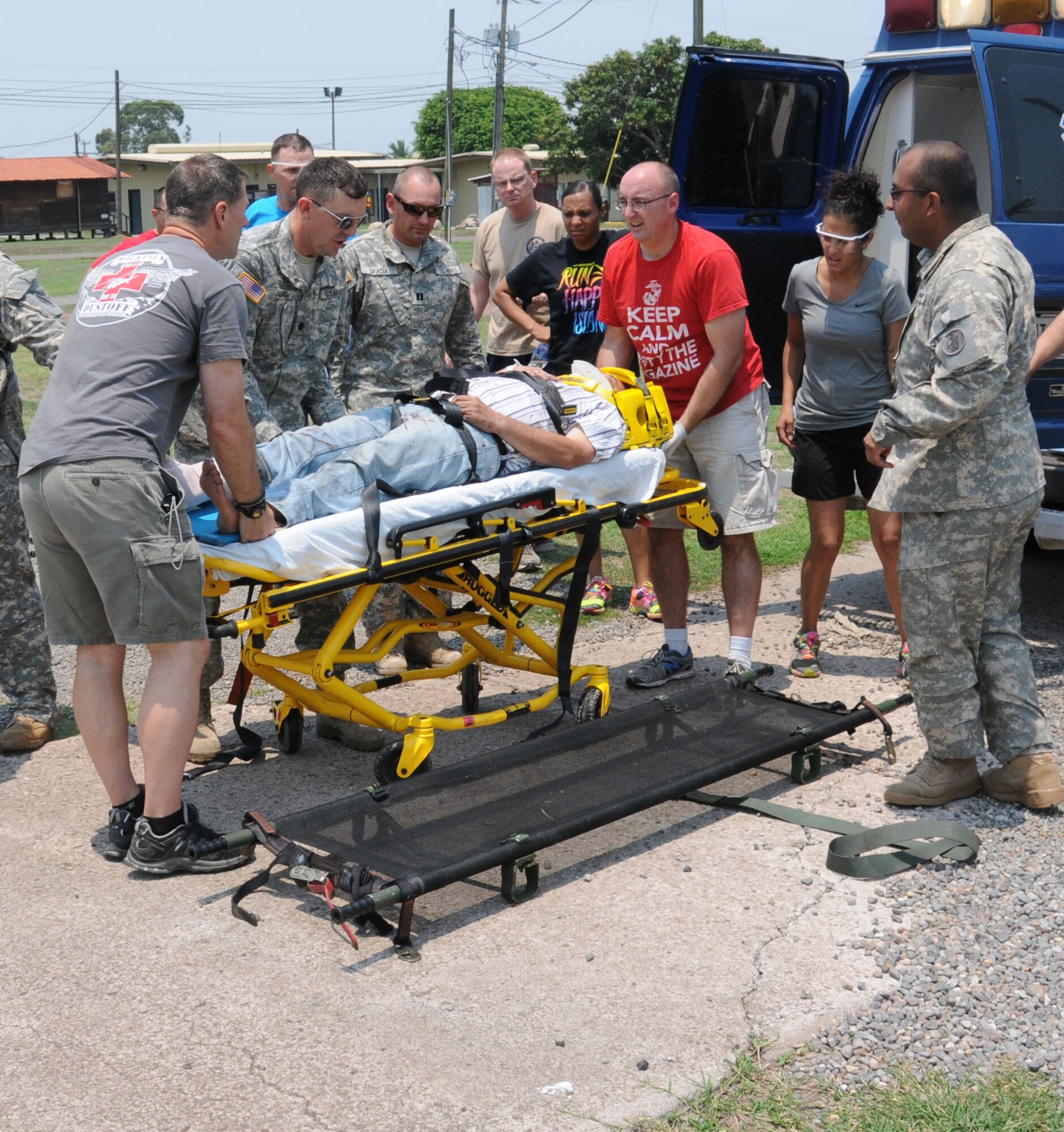 Personnel from Joint Task Force-Bravo’s Medical Element (MEDEL) remove an automobile accident patient from an ambulance to prepare him for an air medical evacuation (MEDEVAC) to Hospital Militar in Tegucigalpa, Honduras, May 13, 2014.  Joint Task Force-Bravo’s Medical Element (MEDEL) and 1-228th Aviation Regiment responded to a Honduran government request for a ground and air medical evacuation (MEDEVAC).  A vehicle traveling west on Honduras Highway CA-5 about 13 miles outside of Comayagua was struck from behind by a tractor trailer truck.  The 18-wheeler subsequently pushed the vehicle into the trailer of another tractor trailer crushing the vehicle.  (Photo by U. S. Air National Guard Capt. Steven Stubbs)
