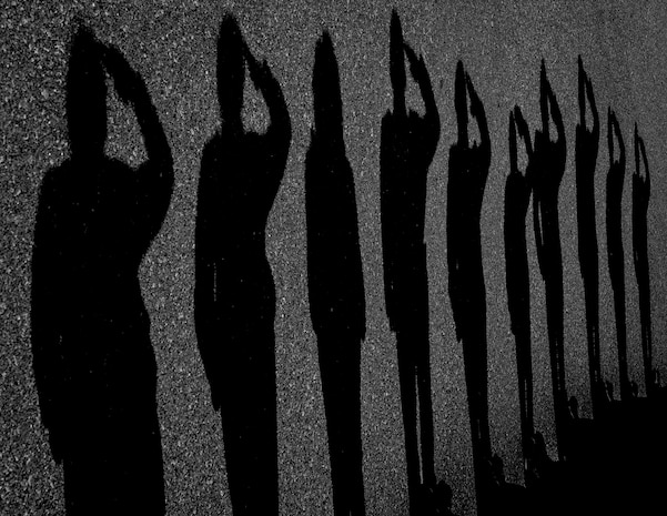 Joint Base Charleston leadership salutes Gen. Darren McDew, Air Mobility Command commander, May 21, 2014, upon his arrival at JB Charleston, S.C.  McDew visited JB Charleston where he attended the 437th Airlift Wing change of command, held an ‘All-Call’ and officiated Col.  Darren Hartford’s promotion to brigadier general.. (U.S. Air Force photo/ Senior Airman Dennis Sloan)