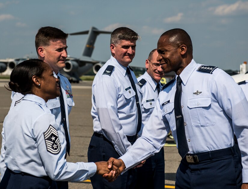 Gen. Darren McDew, Air Mobility Command commander, is greeted by Joint Base Charleston leadership May 21, 2014 at JB Charleston, S.C.  McDew visited JB Charleston where he attended the 437th Airlift Wing change of command, held an ‘All-Call’ and officiated Col. Darren Hartford’s promotion to brigadier general. (U.S. Air Force photo/ Senior Airman Dennis Sloan)