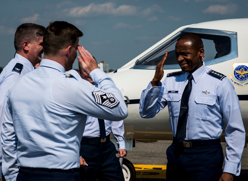Gen. Darren McDew, Air Mobility Command commander, is greeted by Joint Base Charleston leadership May 21, 2014, at JB Charleston, S.C.  McDew visited JB Charleston where he attended the 437th Airlift Wing change of command, held an ‘All-Call’ and officiated Col. Darren Hartford’s promotion to brigadier general. (U.S. Air Force photo/ Senior Airman Dennis Sloan)