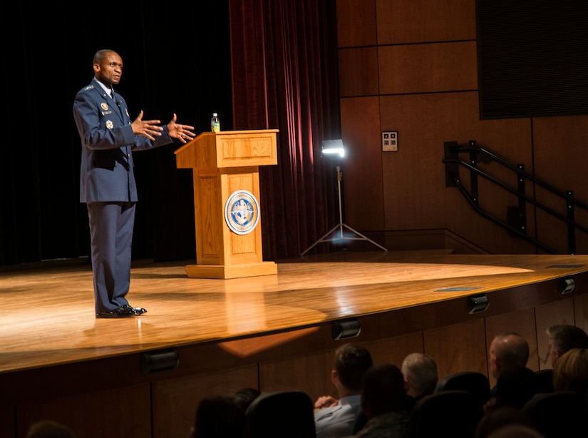 Gen. Darren  McDew, Air Mobility Command commander, speaks with Airmen during an ‘All-Call,’ May 22, 2014, at Joint Base Charleston, S.C. McDew visited JB Charleston where he attended the 437th Airlift Wing change of command, held an ‘All-Call’ and officiated Col. Darren Hartford’s promotion to brigadier general. (U.S. Air Force photo/ Staff Sgt. Rasheen Douglas)