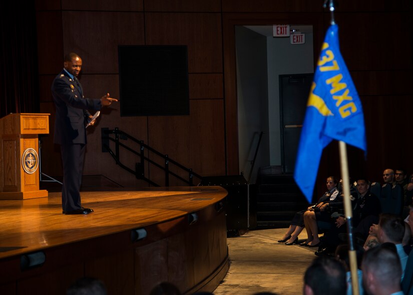 Gen. Darren McDew, Air Mobility Command commander, speaks with Airmen May 22, 2014, during an ‘All Call’ at Joint Base Charleston, S.C. McDew visited JB Charleston where he attended the 437th Airlift Wing change of command, held an ‘All-Call’ and officiated Col. Darren Hartford’s promotion to brigadier general. (U.S. Air Force photo/ Staff Sgt. Rasheen Douglas)