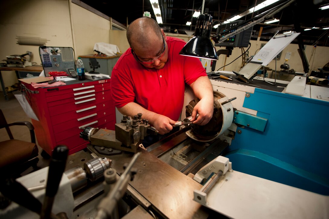 Joseph Reyes, 982nd Maintenance Squadron metal fabricator, makes a training tool May 21, 2014. The 982nd Training Group here received the Verne Orr award for the 2013 fiscal year.  The award is presented annually by the Air Force Association to a unit or organization that utilizes its human resources to most effectively to accomplish the Air Force mission. (U.S. Air Force photos by Airman 1st Class Jelani Gibson) 