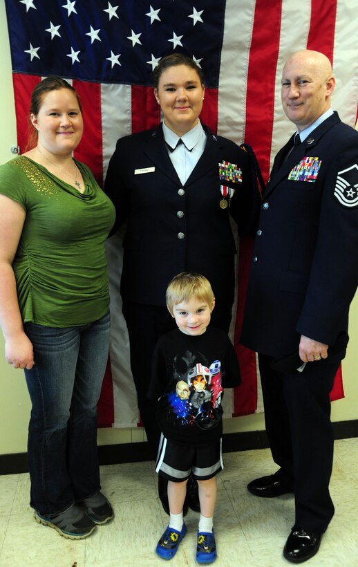 Master Sgt. John Franke and his wife Stephanie, stand with their young son and daughter, Air Force JROTC Cadet, Lt. Kristina Franke, after she won the Armed Services YMCA National Essay Contest on May 15, 2014, at the Arlington Career Center, Va. According to her essay, her father, 11th Security Forces Group superintendent of resources, is her military hero. (U.S. Air Force photo/ Staff Sgt. Amber J. Russell)